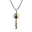 Collier hippie chic composé d’un cordon noir, d’un cercle en bronze garni de perles noires et bronzes harmonieusement mêlées, d’un bouquet de chaînettes orné de perles noires.