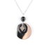 Collier art déco Ciewenn composé d’une chaîne en acier inoxydable. Elle est décorée d’une superposition d’une pampille ronde inox, d’un cercle noir et d’un losange inox. Une jolie perle noire à facettes finit l’ensemble.