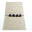 Ce Bracelet art déco Ciewenn est composé d'une chaîne billes en acier inoxydable, orné d'un mélange harmonieux de perles inox et noires.