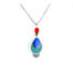 Collier art déco Ciewenn composé d'une chaîne en acier inoxydable, de perles, de pampilles géométriques, d'une chaînette décorée de perles.