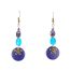 Boucles d’oreilles hippies chics Ciewenn composées de perles d'un mélange harmonieux de perles bleues et bronze, du bois, du verre et du métal.