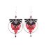 Boucles d'oreilles créolescCieWenn composées d'un grand cercle inox, d'un micro macramé rouge, de pampilles et de perles rouges, noires et argentés.