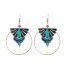 Boucles d'oreilles créoles CieWenn composées d'un grand cercle bronze, d'un micro macramé bleu de pampilles bleues, noires et bronzes