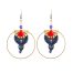 Boucles d'oreilles créoles Ciewenn composées d'un grand cercle bronze, de perles, de pampilles éventail et d'un micro macramé noir et bleu marine
